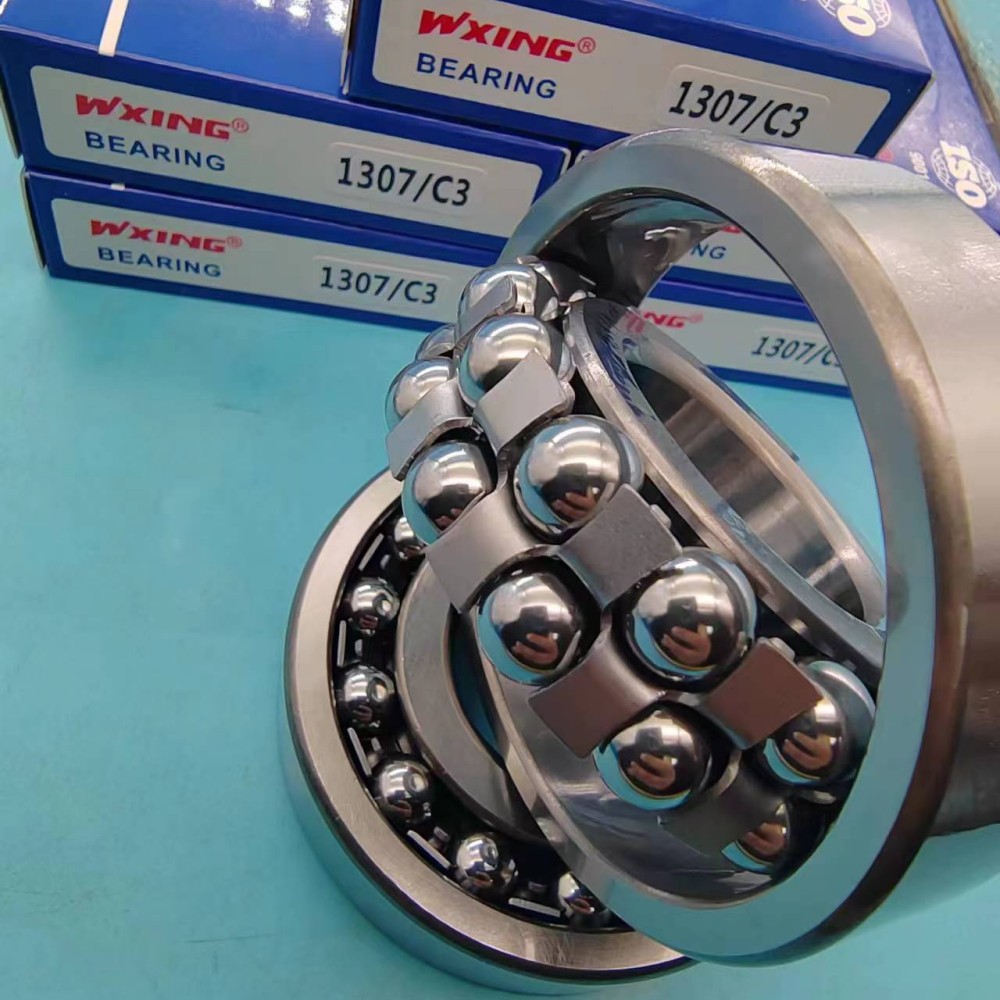What are the causes of self-aligning ball bearing failure?